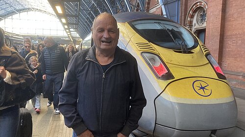 Jim Candy at a station